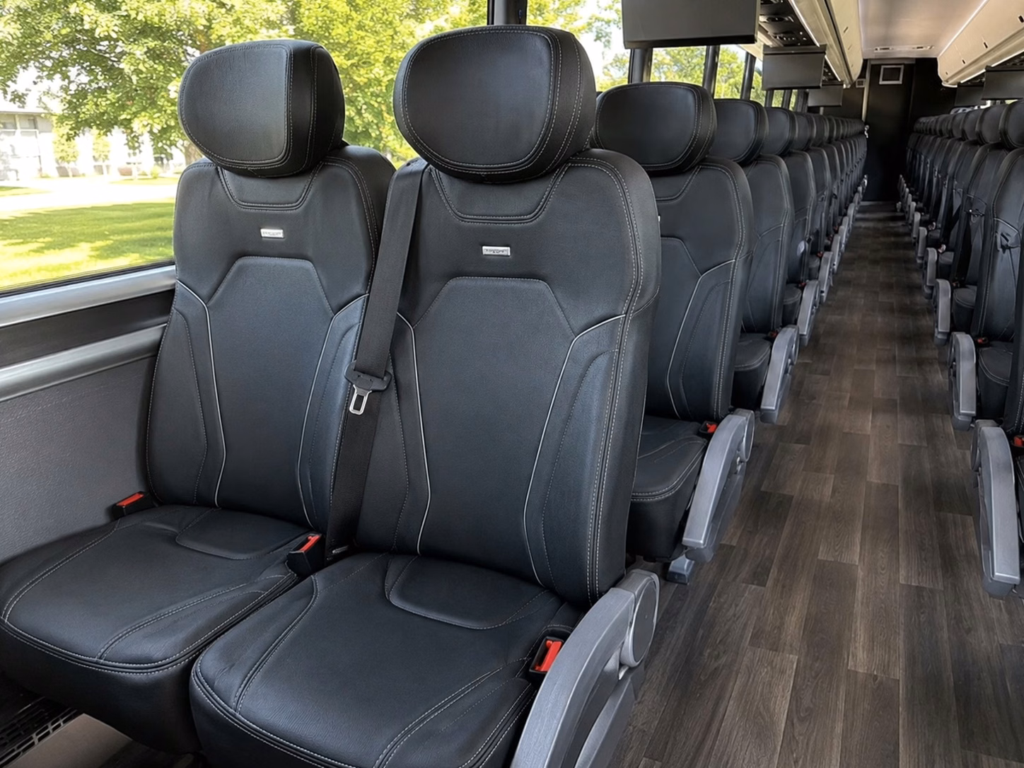 shuttle buses for denton ceremony and reception transportation